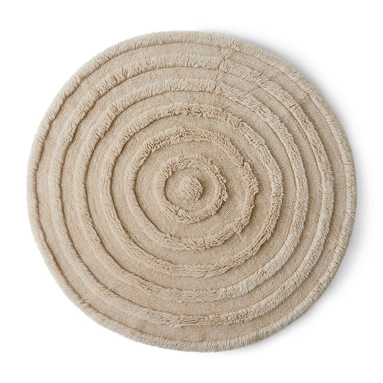 Round woolen rug cream