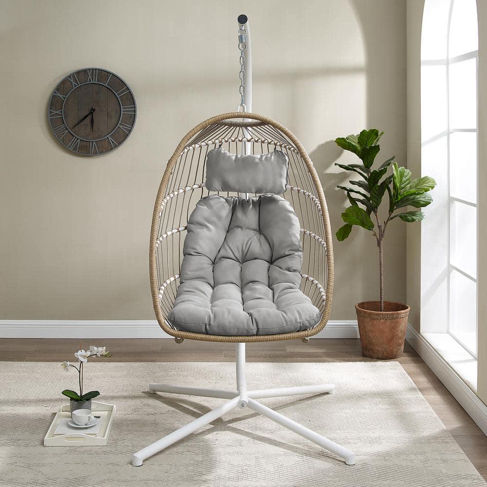 Welwick Designs 1Person Brown Rattan Patio Swing Egg Chair with White Stand and Gray Cushions