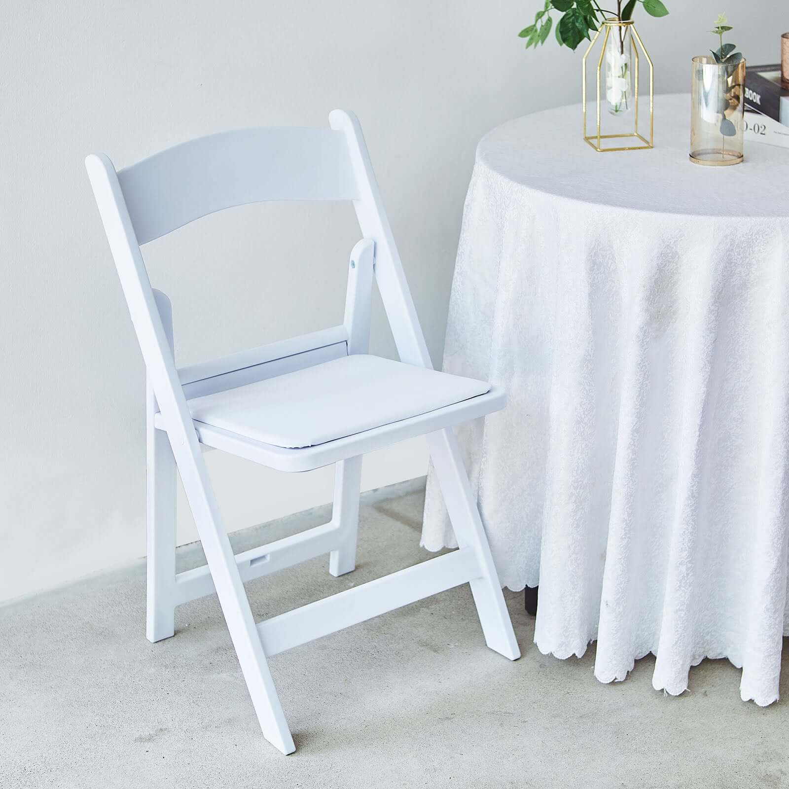 White Resin Folding Chair With Vinyl Padded Seat For Weddings, Indoor or Outdoor Events