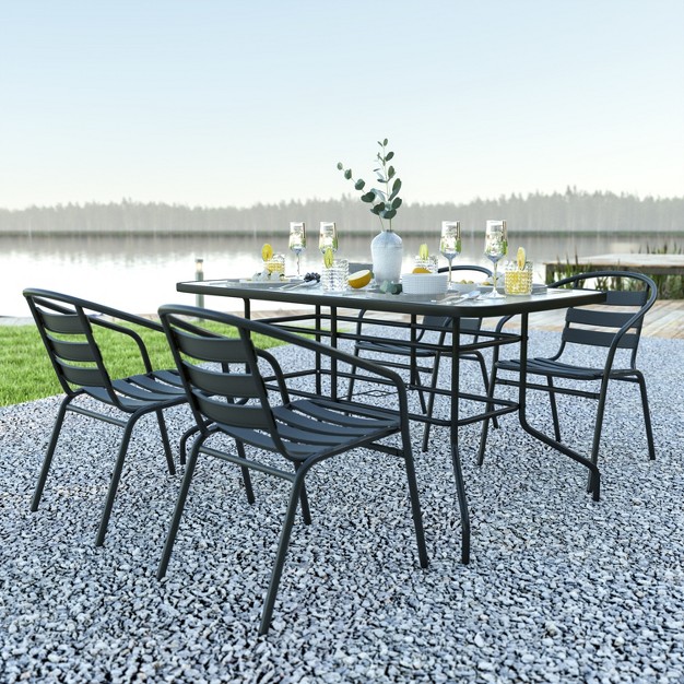 Rectangular Metal Table With Tempered Glass Top And 4 Black Aluminum Stacking Chairs