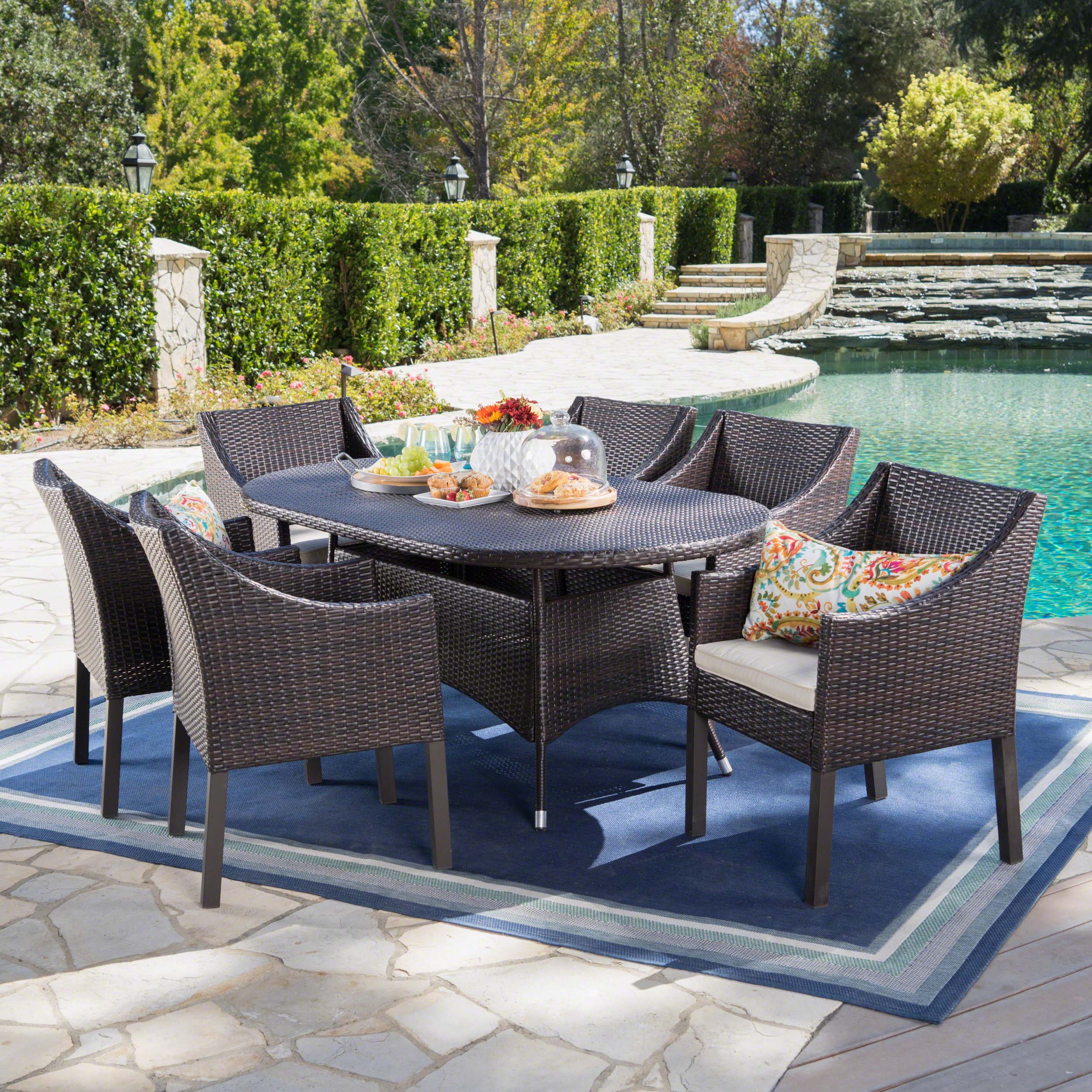 Frances Outdoor 7 Piece Wicker Oval Dining Set with Water Resistant Cushions