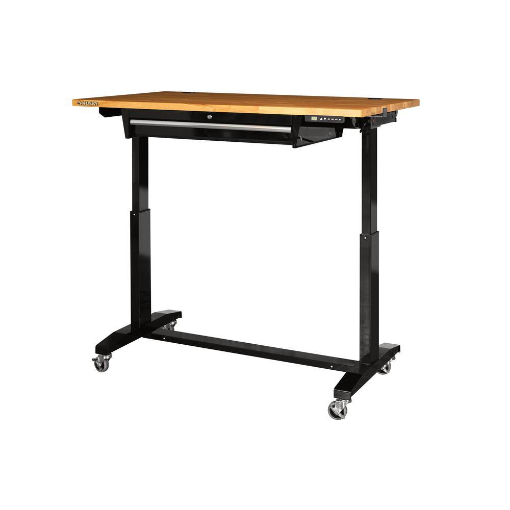 Husky 52 in.W x 30 in. D Steel 1-Drawer Power Adjustable Height Solid Wood Top Workbench Table in Black HOET5201B11XUS