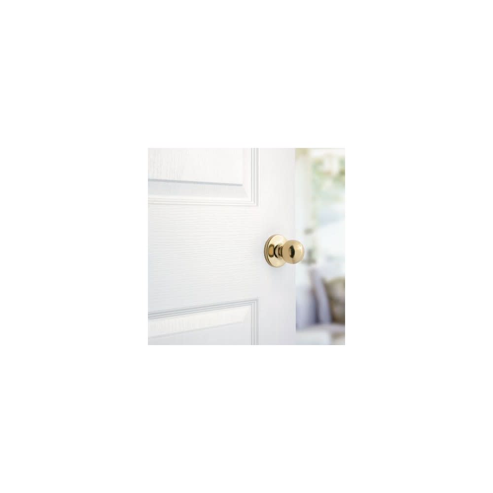 Kwikset Polo Door Knob Polished Brass Hall and Closet Passage Round