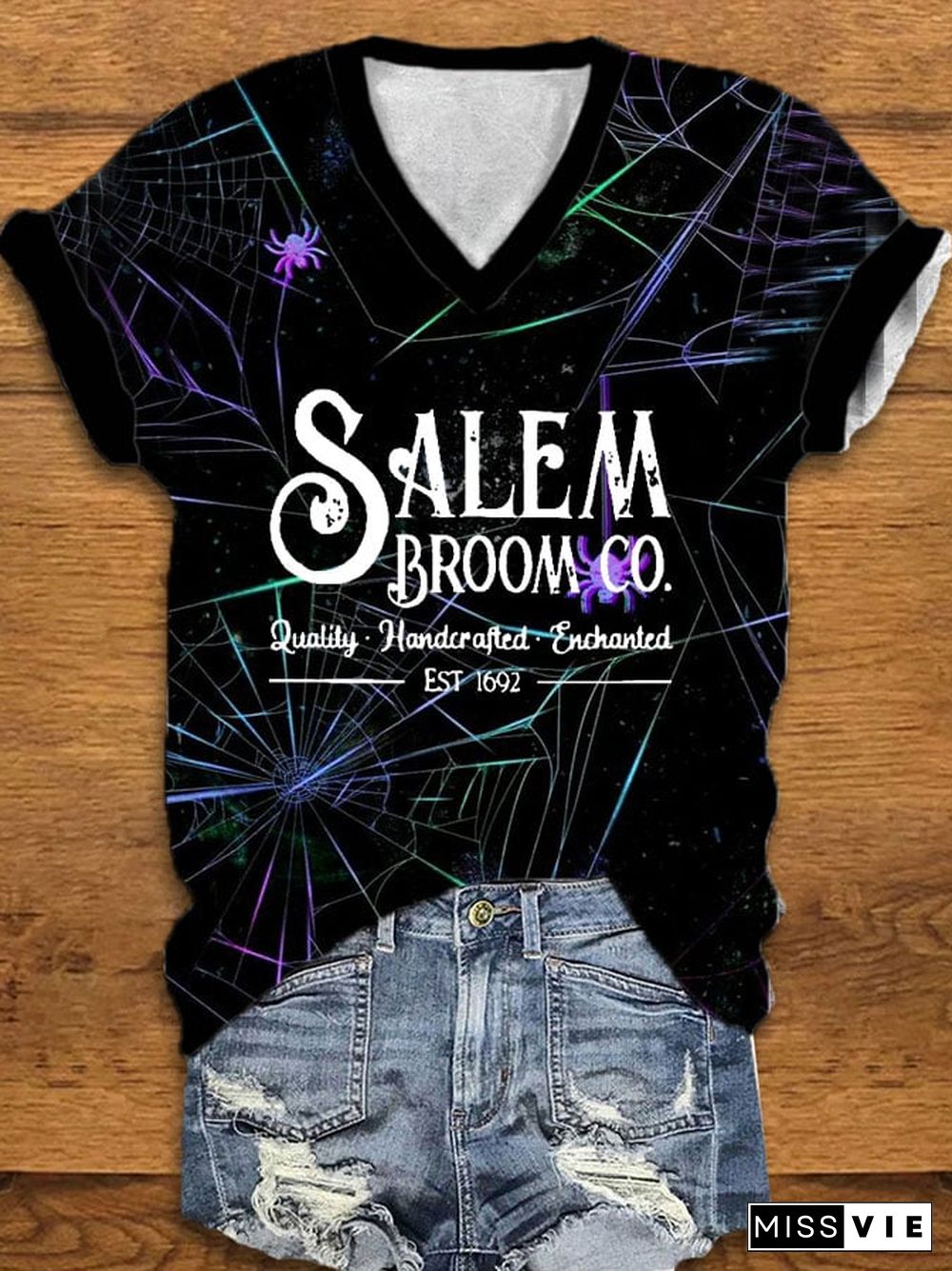 Women's Salem Broom Co Quality Handcrafted Enchanted Est 1692 Print V-Neck Tee