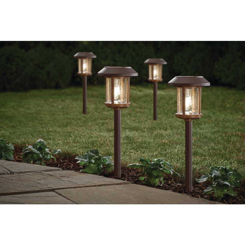 Hampton Bay Lockhart Solar Bronze and Warm Wood LED Path Light 14 Lumens with Ice Glass Lens and Vintage Bulb 2-Tone (4-Pack) SPP51000106PK4