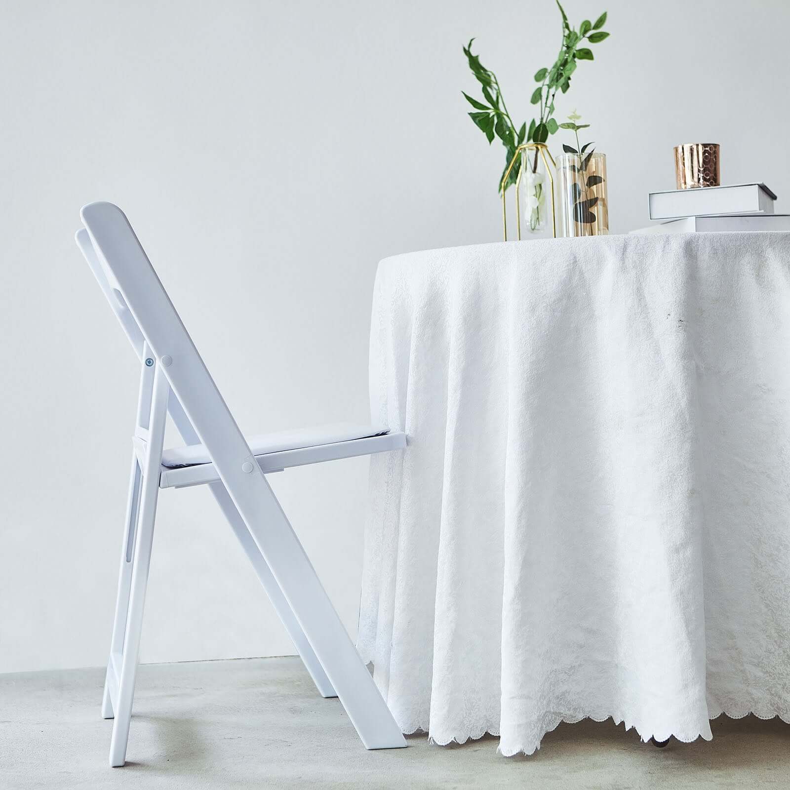 White Resin Folding Chair With Vinyl Padded Seat For Weddings, Indoor or Outdoor Events