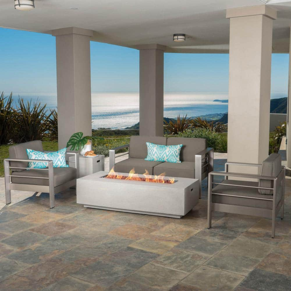 Noble House Cape Coral Silver Finish 5-Piece Aluminum Patio Fire Pit Conversation Set with Khaki Cushions 11883