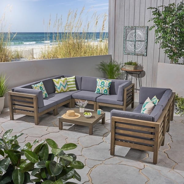 Oana Outdoor 9Piece Acacia Wood Sectional Sofa Set with Coffee Table by Christopher Knight Home