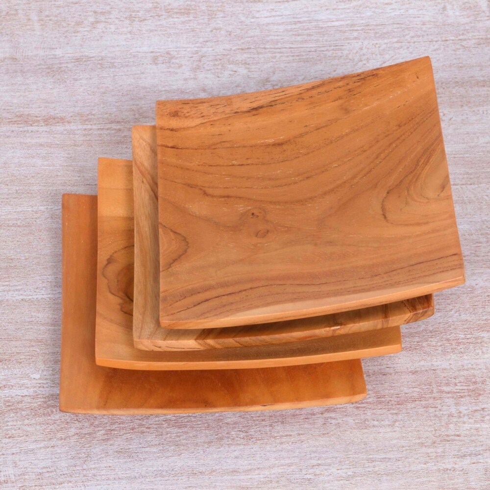 NOVICA Teakwood plates  'Fine Meal' (set of 4)