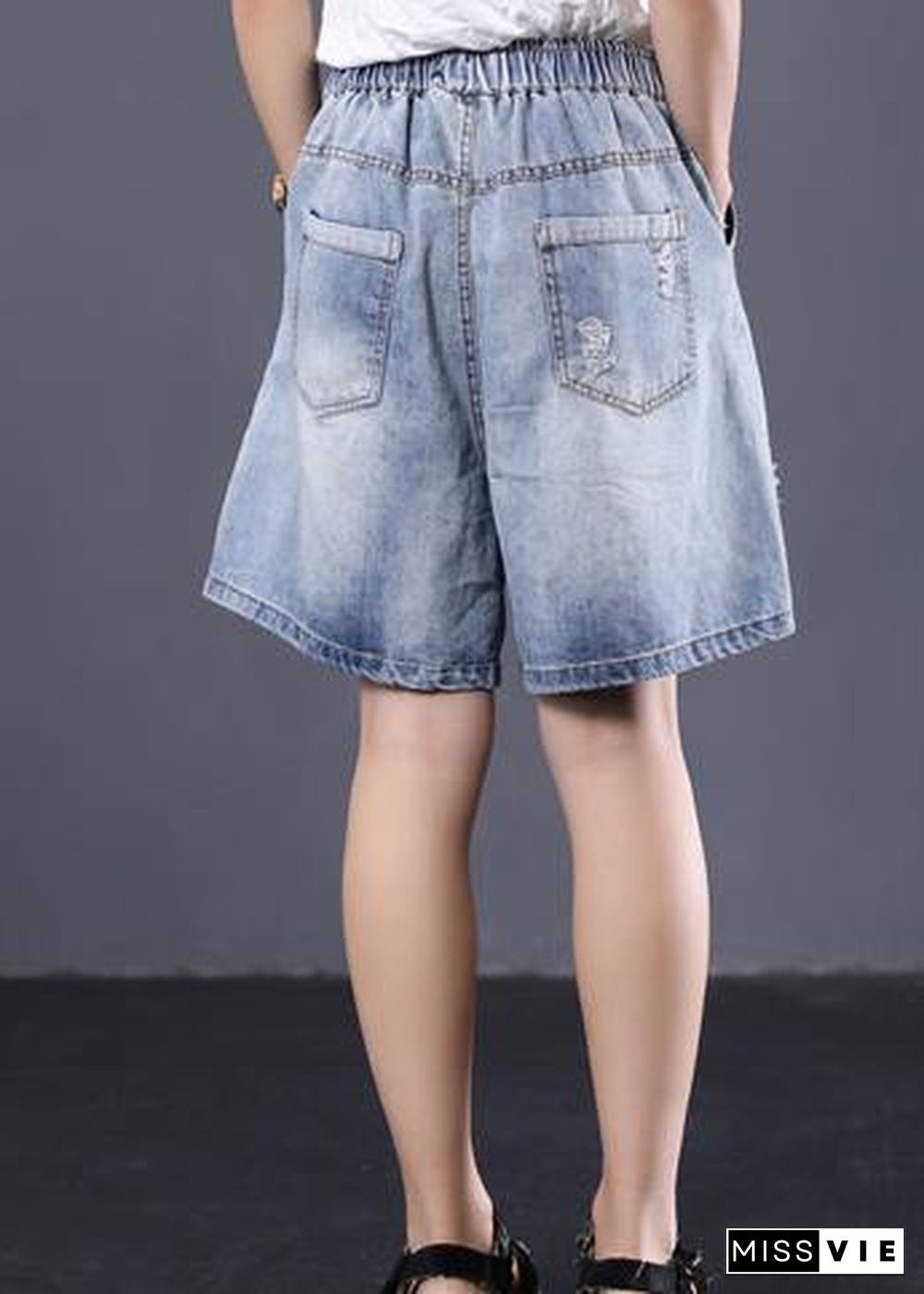 Korean version loose retro washed white Ming line denim shorts