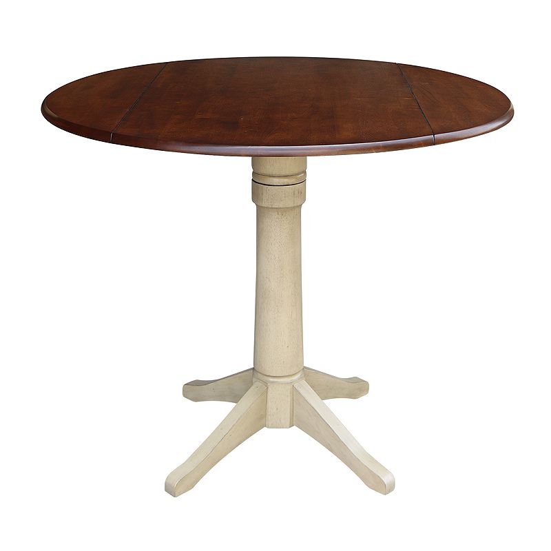 International Concepts Dual Drop Leaf Round Pedestal Dining Table