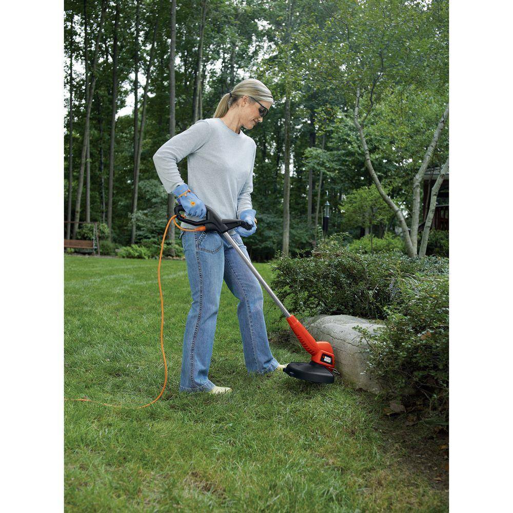 BLACK+DECKER 13 in. 4.0 Amp Corded Electric Straight Shaft Single Line 2-In-1 String Trimmer  Lawn Edger with Automatic Feed ST7700