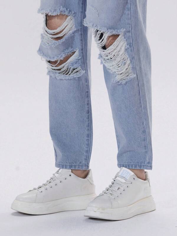 Men Ripped Frayed Tapered Jeans