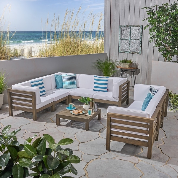 Oana Outdoor 9Piece Acacia Wood Sectional Sofa Set with Coffee Table by Christopher Knight Home