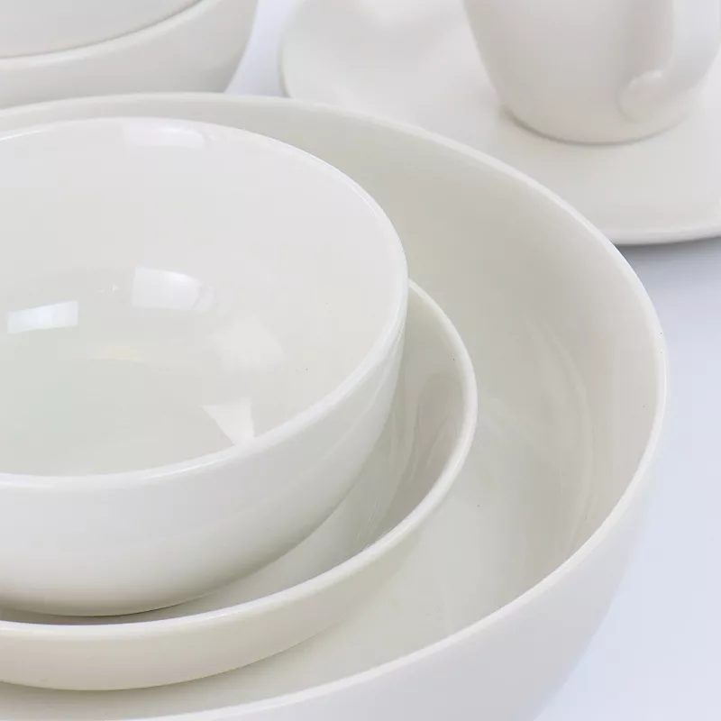 Elama Iris 32 Piece Porcelain Dinnerware Set with 2 Serving Bowls in White