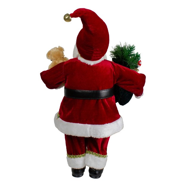 Standing Santa Christmas Figure With A Plush Bear