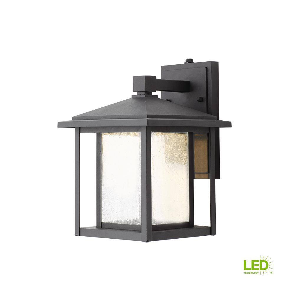 Home Decorators Collection Mauvo Canyon Black Dusk to Dawn Small LED Outdoor Wall Light Fixture with Seeded Glass KB 06304-DEL