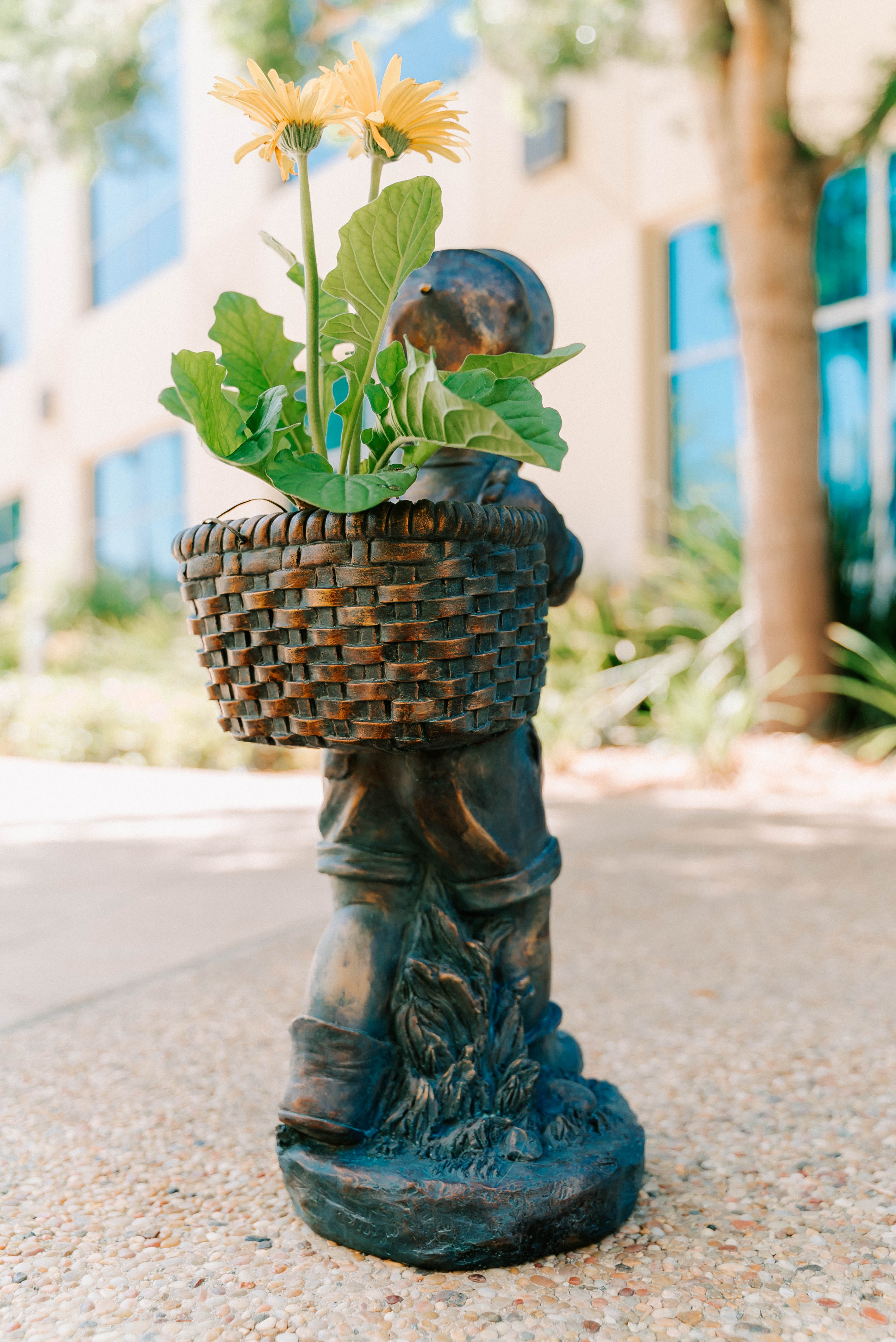 XBrand 24" H Faux Bronze Magnesium Oxide Walking Boy Garden Statue w/Small Flower Plant Pot, Outdoor Décor, Natural Design Sculpture