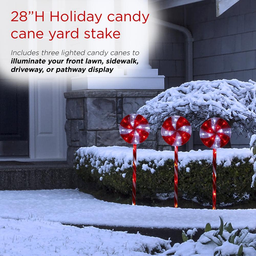 Alpine Corporation 28 in. Tall Candy Cane Pathway with Red and White LED Lights, Set of 3 COR114T-3