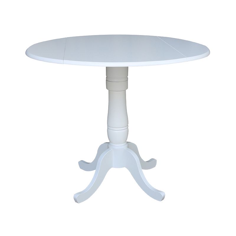 International Concepts Round Pedestal Dual Drop Leaf Dining Table