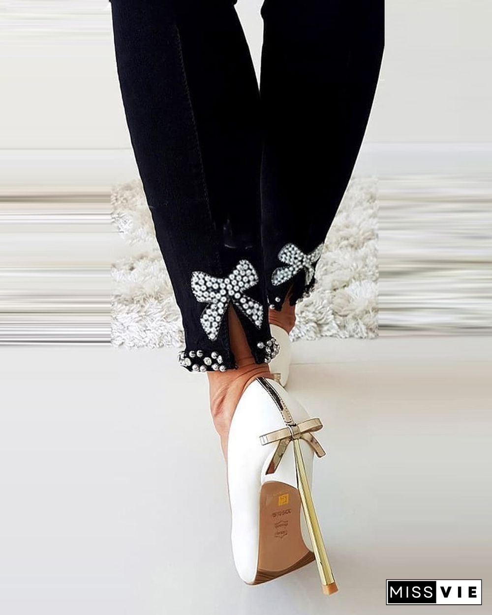 Studded Bowknot Pattern Skinny Jeans