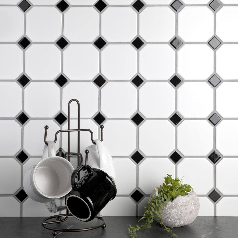 Merola Tile Metro Octagon Matte White wBlack Dot 11 12 in. x 11 12 in. Porcelain Mosaic  9.4 sq. ft. Case FXLM2OWD