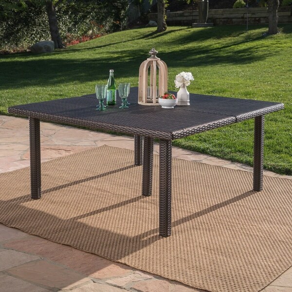 Outdoor 64 Inch Square Dining Table with Wicker Pulled Over an Iron Frame