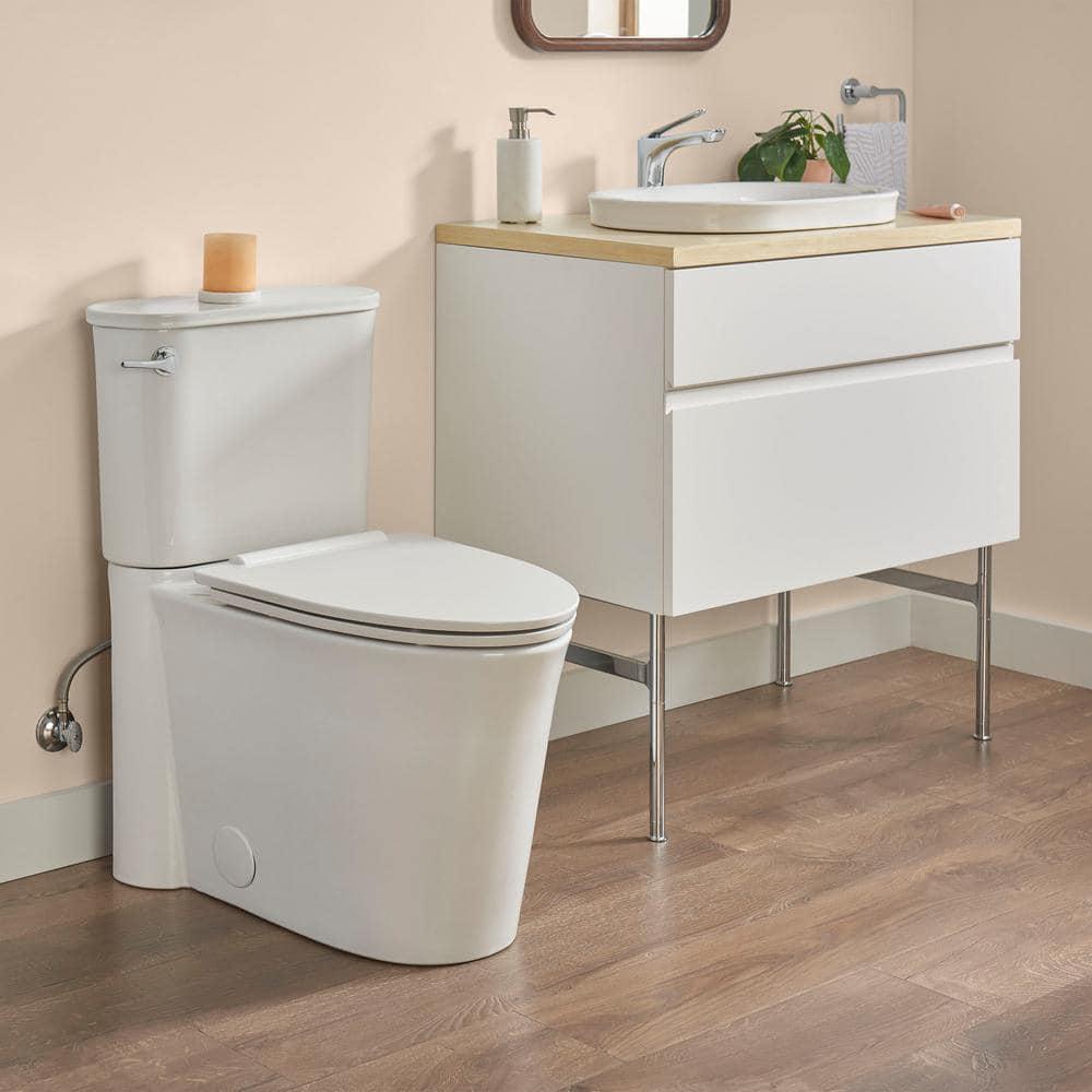 American Standard Studio S Right Height 2piece 128 GPF Single Flush Elongated Toilet with Left Hand Trip Lever in White Seat Included