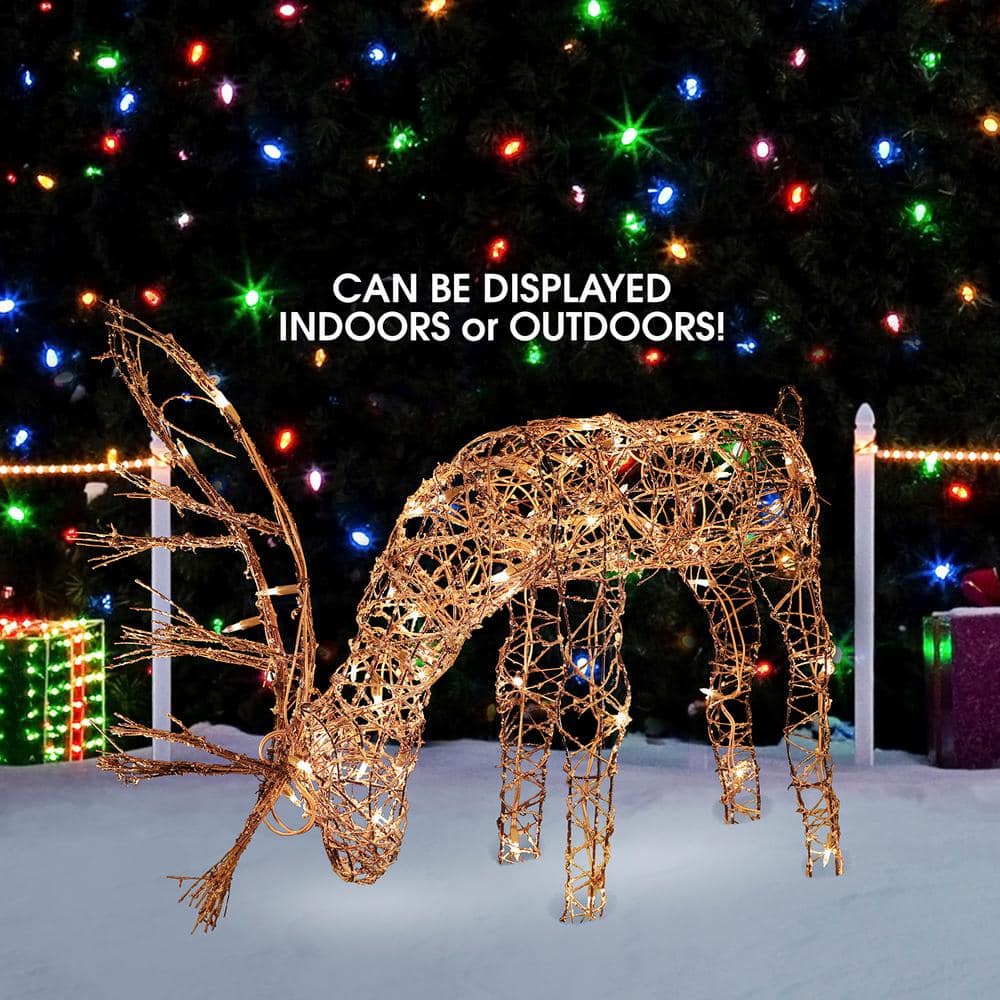 Alpine Corporation 24 in. Tall Rattan Grazing Reindeer Decoration with Halogen Lights AUH166