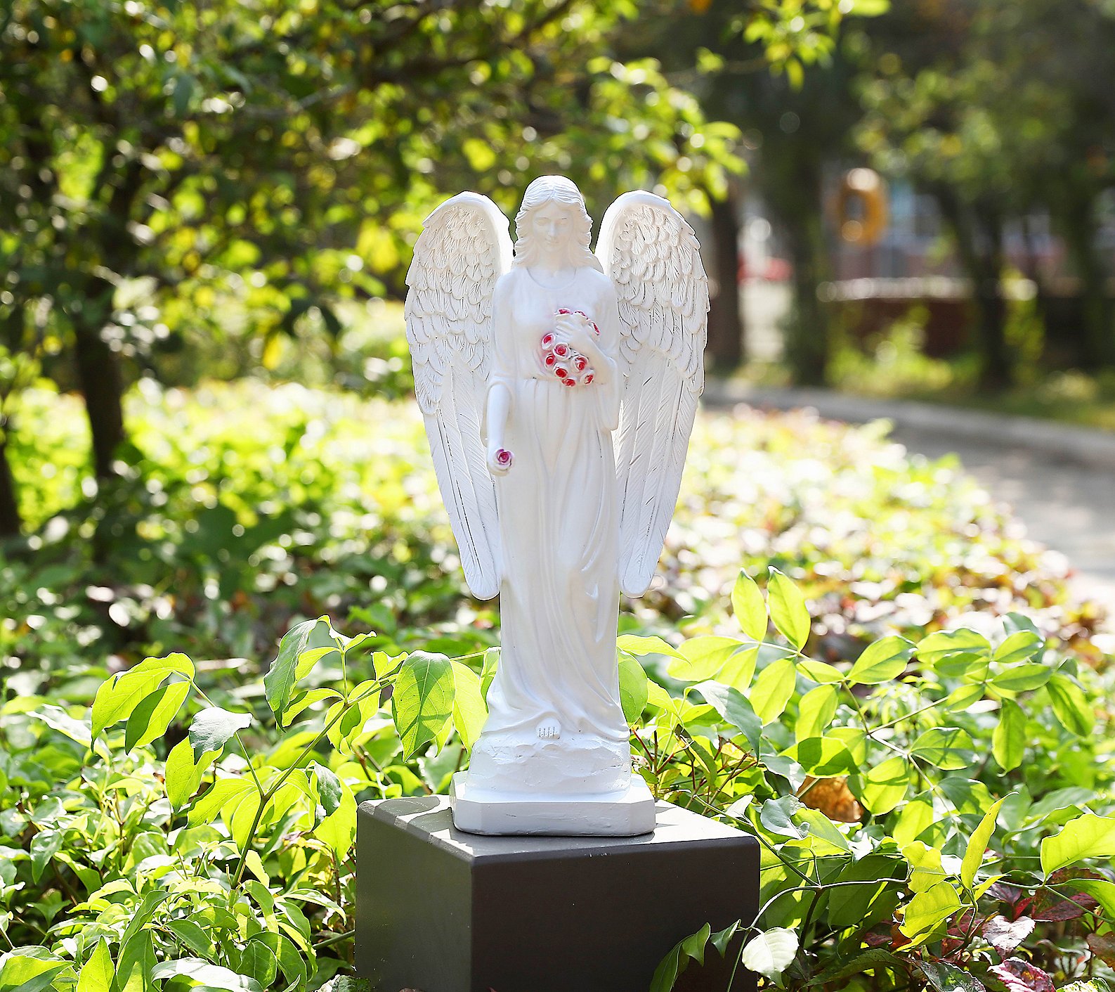 Techko Angel with Closed Wings Statue with Solar Spotlight