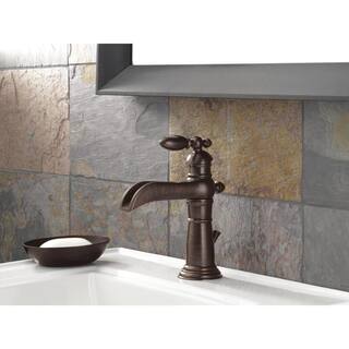 Delta Victorian Single Hole Single-Handle Open Channel Spout Bathroom Faucet with Metal Drain Assembly in Venetian Bronze 554LF-RB