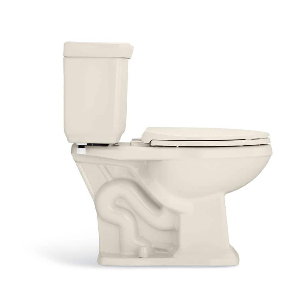 Glacier Bay 2piece 10 GPF128 GPF High Efficiency Dual Flush Elongated Toilet in Bone Seat Included