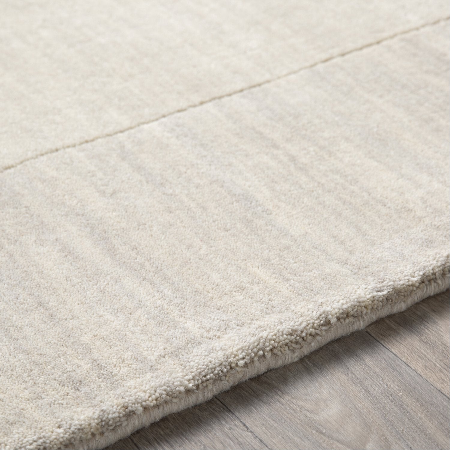 Mystique Collection Wool Area Rug in Parchment and Winter White