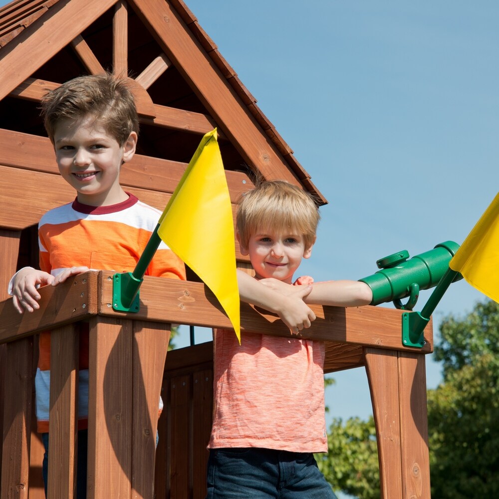 Swing N Slide Jamboree Fort Wooden Swing Set w/ Rock Wall  Picnic Table and Awning   13' W x 13' L x 9' 6\