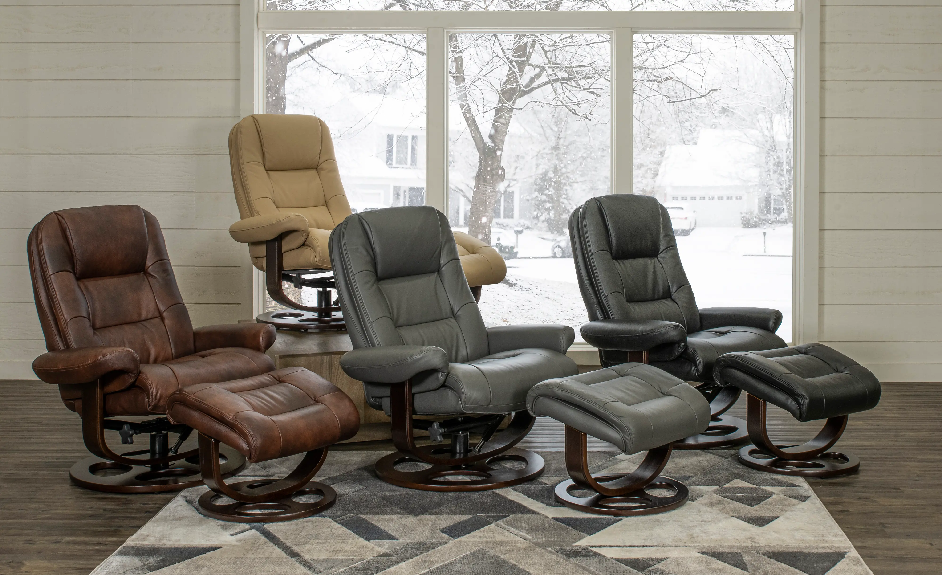 Wasatch Black Leather Swivel Recliner with Matching Ottoman