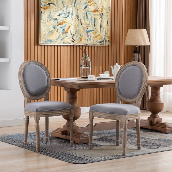 Upholstered Fabrice French Dining Chair with rubber legs