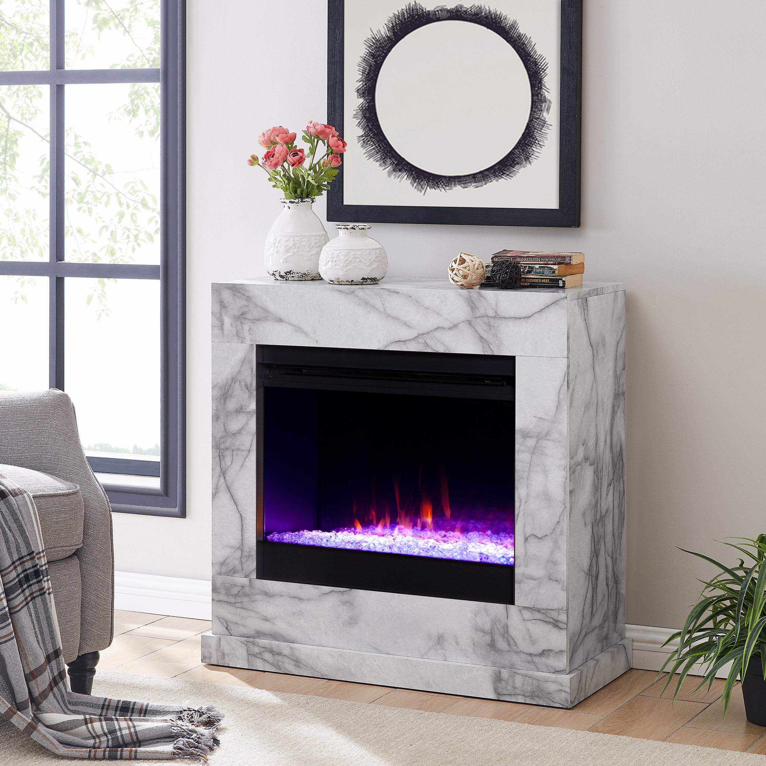 SEI Furniture Claredale Freestanding Color Changing Electric Fireplace in White with Faux Marble