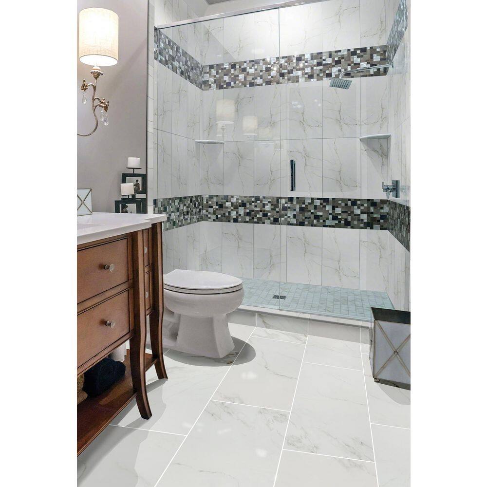 Home Decorators Collection Carrara 12 in. x 24 in. Polished Porcelain Stone Look Floor and Wall Tile (16 sq. ft.Case) NHDCARR1224P