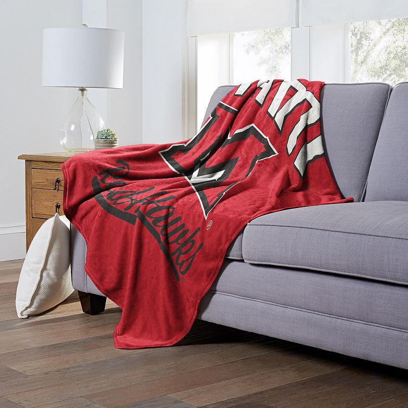 The Northwest Miami RedHawks Alumni Silk-Touch Throw Blanket