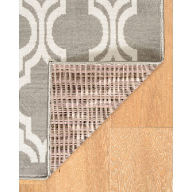 Capri Quatrafoil Rug Linon