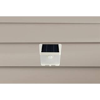 HALO SWL 70-Watt White Motion Activated Outdoor Integrated LED Solar Wedge Light Dusk to Dawn 800 Lumens 4000K SWL0840W