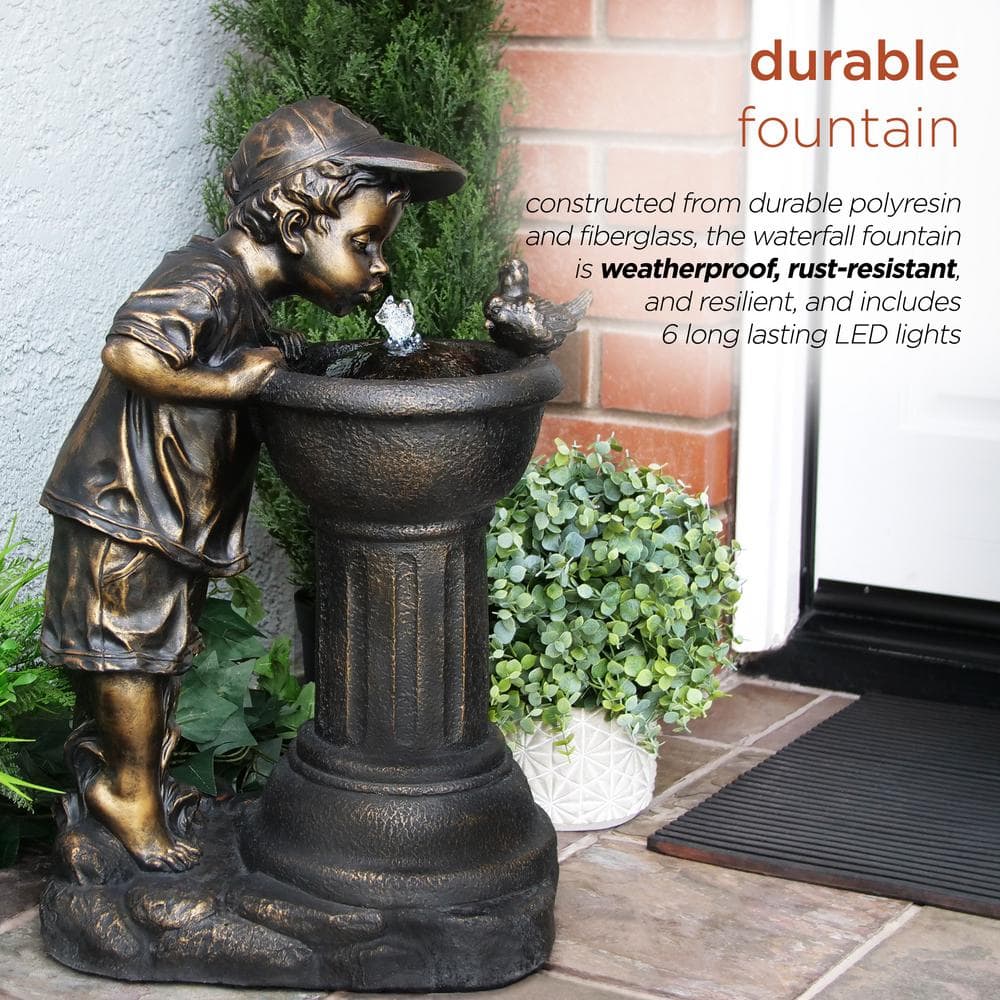 Alpine Corporation 27 in. Tall Indoor/Outdoor Boy Drinking From Water Fountain with LED Lights, Bronze GXT740