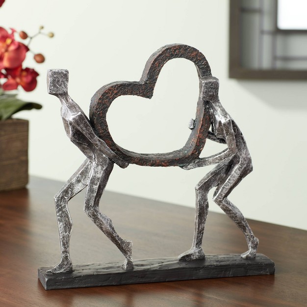 High Figurines And Heart Sculpture