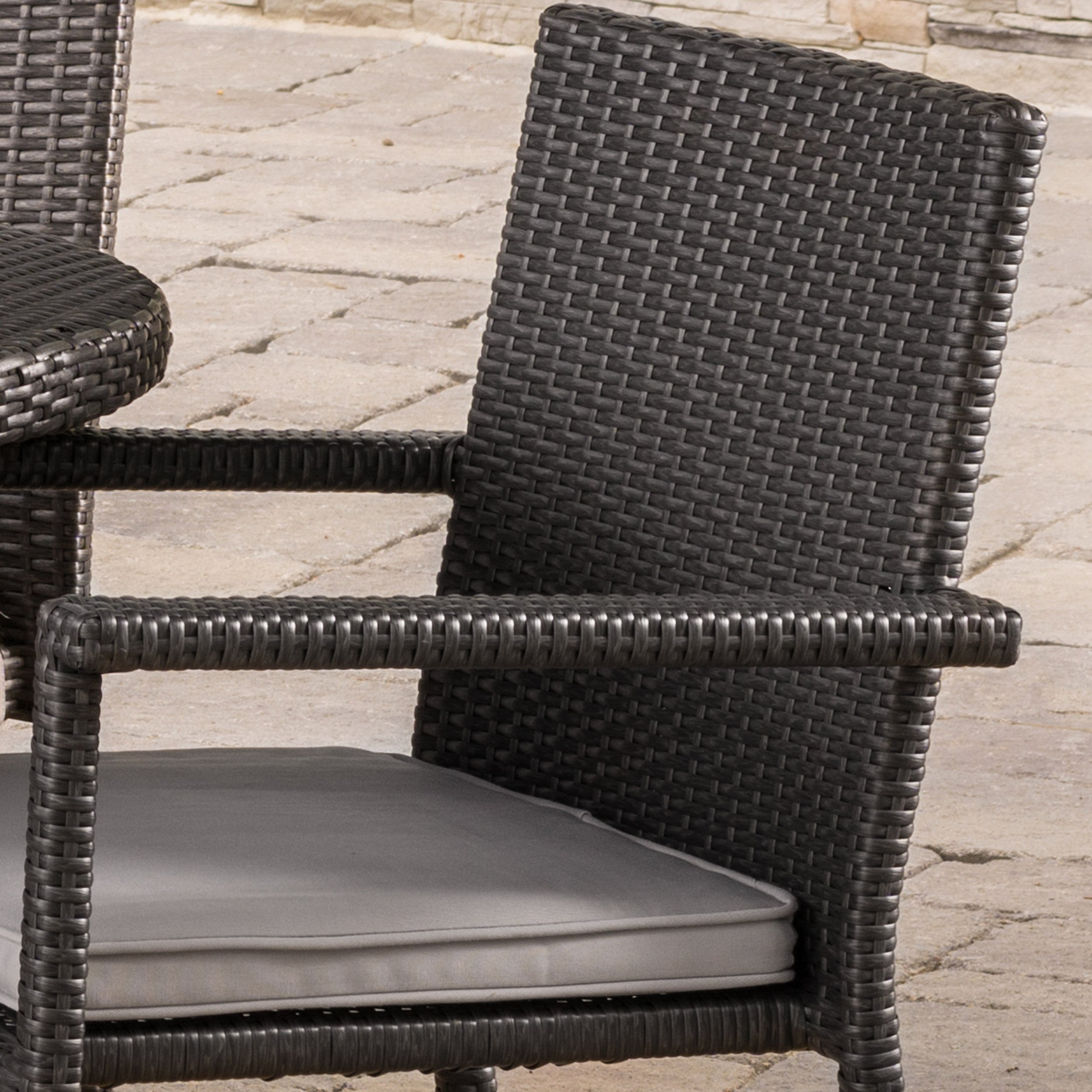 Logan Outdoor 7 Piece Wicker Dining Set with Armed and Armless Stacking Chairs