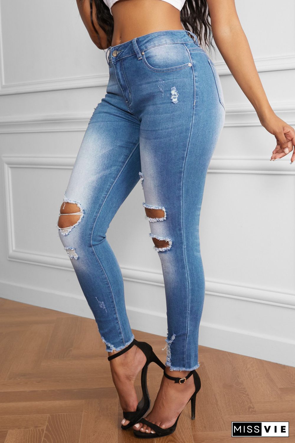 Faded Mid High Rise Jeans with Holes