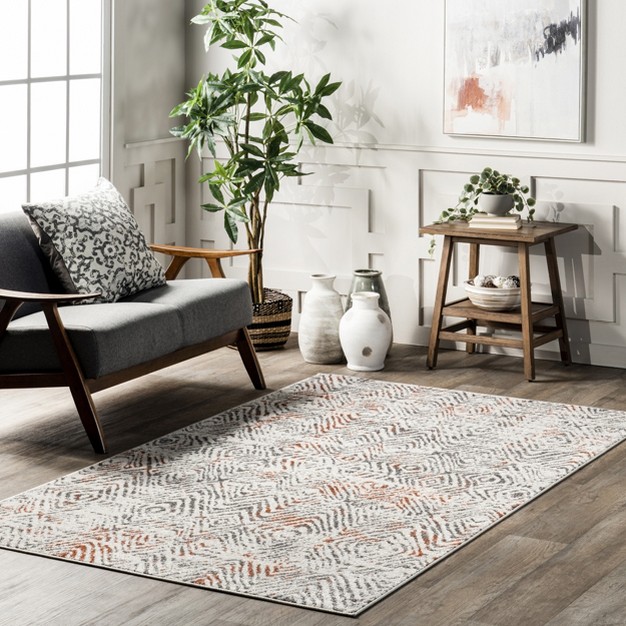 Cathrine Geometric Distressed Area Rug