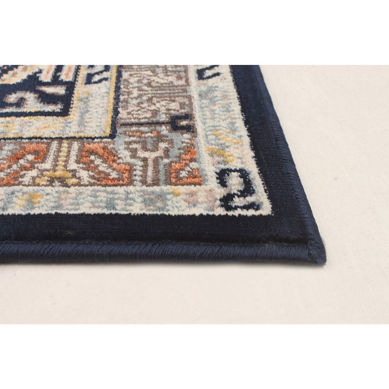 2.5' x 10' Navy Blue and Cream Medallion Geometric Rectangular Rug Runner