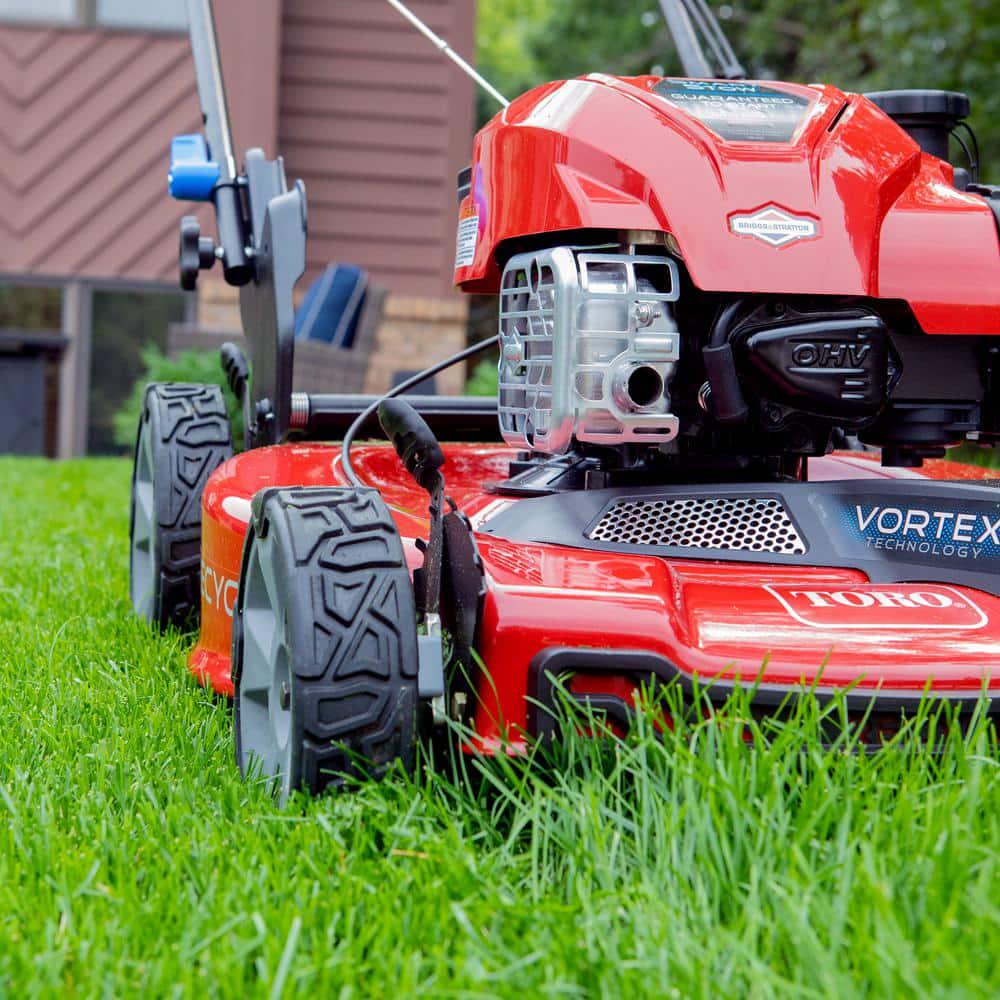 Toro 22 in Recycler SmartStow Briggs and Stratton High Wheel FWD Gas Walk Behind Self Propelled Lawn Mower