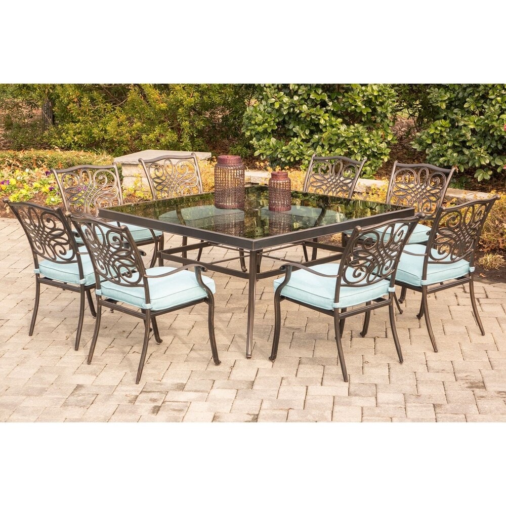 Hanover Traditions Bronze finished Aluminium Blue Cushions 9 piece Dining Set with 60 inch Square Glass top Table