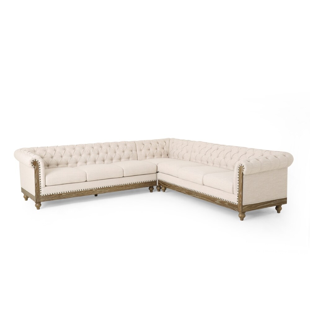 Castalia Chesterfield Tufted 7 seat Sectional Sofa by Christopher Knight Home   114.00\